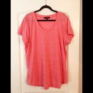 Pink short sleeve T-shirt. Never worn. No tags